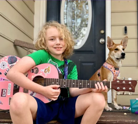 Owen playing guitar