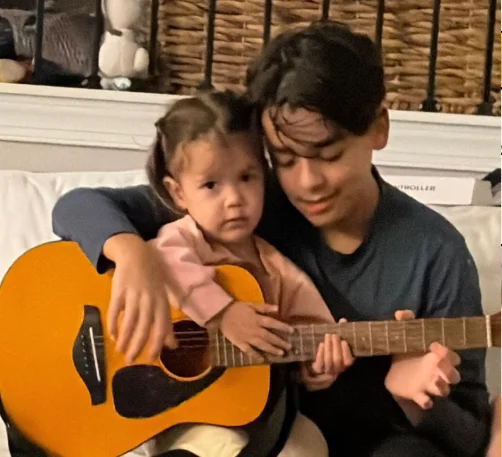 Rodrigo playing guitar